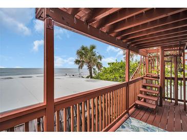 Stunning ocean view from a private deck with stairs at 18838 Gulf Blvd # 202, Indian Shores, FL 33785
