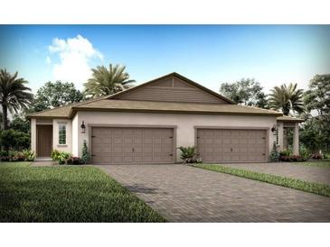 Two-story home with taupe siding, brown roof, and a two-car garage at 20249 Symphony Pl, Venice, FL 34293