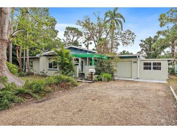 Charming single story home with carport and landscaped yard at 200 57Th S Ave, St Petersburg, FL 33705
