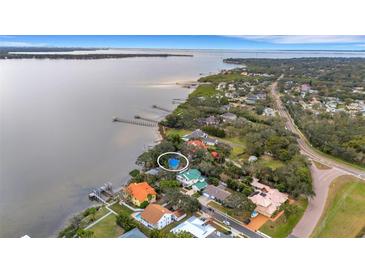 Aerial view showing home's waterfront location and surrounding area at 2886 Bay Shore Dr, Safety Harbor, FL 34695