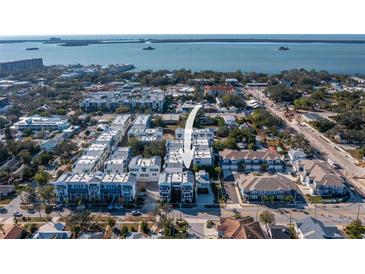 Aerial view of townhouses near the water at 946 Highland Ave # 1, Dunedin, FL 34698