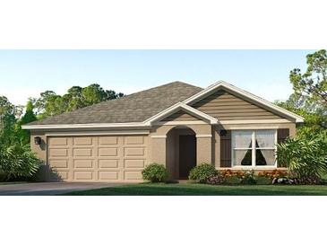 Single-story house with a two-car garage and landscaped yard at 10873 Gentle Current Way, Parrish, FL 34219
