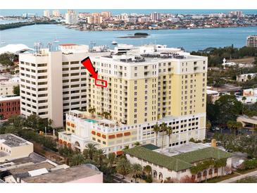 Aerial view of a high-rise building with city and water views at 628 Cleveland St # 1201, Clearwater, FL 33755