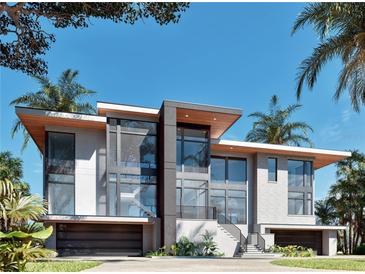 Modern two-story home with a clean design and large windows at 2414 N Riverside Dr, Tampa, FL 33602