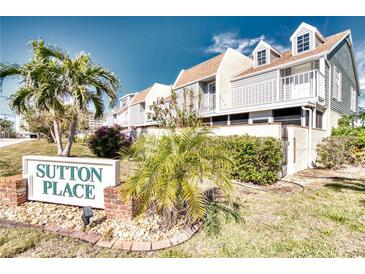 Sutton Place townhome community entrance sign at 744 Cadiz Rd # 1, Venice, FL 34285