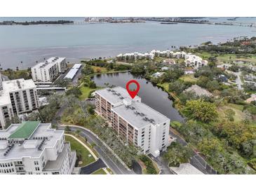 Aerial view of condo building near water at 220 Belleview Blvd # 607, Belleair, FL 33756
