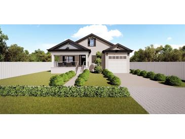 Craftsman style home with a front porch and landscaped yard at 3305 W Oak Ave, Plant City, FL 33563