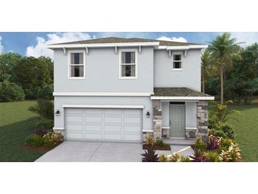 Two-story house with gray siding, stone accents, and a two-car garage at 3483 Hilltop Cir, Lakewood Ranch, FL 34211
