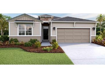 Attractive one-story home with a two-car garage and landscaped front yard at 18216 Beach Ranch Ter, Lakewood Ranch, FL 34211