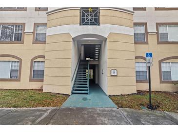 Exterior view of building showing entrance and staircase at 17108 Carrington Park Dr # 710, Tampa, FL 33647