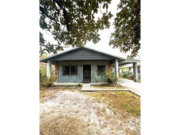 Charming one-story home with a covered porch at 3407 N 51St St, Tampa, FL 33619