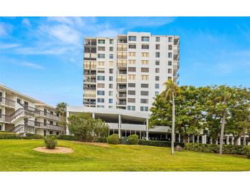 High rise building with lush landscaping and a beautiful view at 6287 Bahia Del Mar Cir # 208, St Petersburg, FL 33715