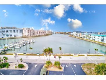 Aerial view of waterfront community with boat slips and lush landscaping at 3010 59Th S St # 201, Gulfport, FL 33707