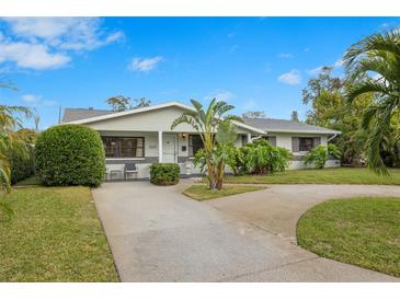 Charming single story home with landscaped yard and driveway at 5243 27Th N Ave, St Petersburg, FL 33710