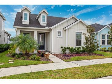 Two-story house with welcoming front porch at 3809 Lajuana Blvd, Wesley Chapel, FL 33543
