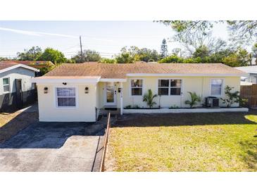 Charming ranch home with a well-maintained lawn and updated facade at 6554 34Th N Ave, St Petersburg, FL 33710