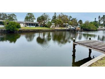 Tranquil canal view with private dock, perfect for boating enthusiasts at 4919 Shore Acres Ne Blvd, St Petersburg, FL 33703