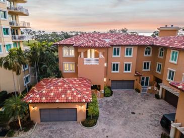 Luxury waterfront home with terracotta roof and private courtyard at 595 5Th Ne Ave, St Petersburg, FL 33701