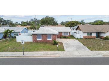 House's exterior and driveway, street view at 6950 113Th St, Seminole, FL 33772