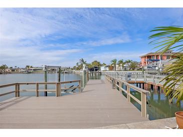 Private dock with water access. Perfect for boating and enjoying Florida's waterways at 407 Boca Ciega Point N Blvd, St Petersburg, FL 33708