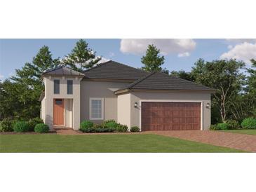 One-story home with a brown garage door and orange front door at 10852 Ibis Brook Ct, Land O Lakes, FL 34638