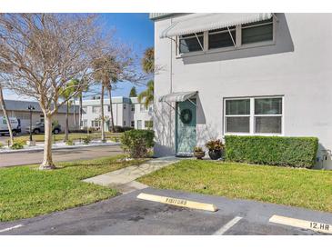 Inviting condo exterior with visitor parking at 5267 81St N St # 12, St Petersburg, FL 33709