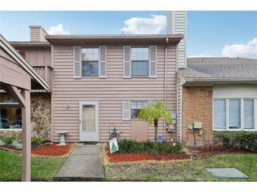 Inviting two-story condo with landscaped front yard at 5328 Ridgewell Ct, Tampa, FL 33624