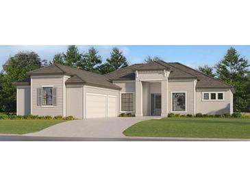 Two-story house with a three-car garage and landscaped lawn at 18710 Cherrystone Way, Lakewood Ranch, FL 34211