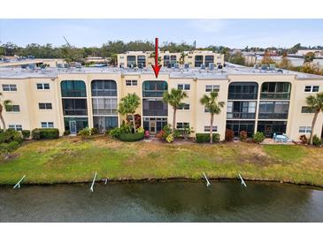 Aerial view of condo building with water access at 11485 Oakhurst Dr # 1100-312, Largo, FL 33774