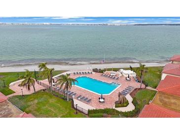 Aerial view of resort-style pool and beach access at 6051 Sun Blvd # 504, St Petersburg, FL 33715