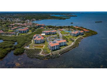 Aerial view of waterfront community, showing location of condo at 102 Mariner Dr, Tarpon Springs, FL 34689