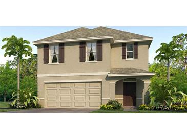 Two-story house with beige exterior, brown accents, and a two-car garage at 5330 Oxford Gray Rd, Wesley Chapel, FL 33545