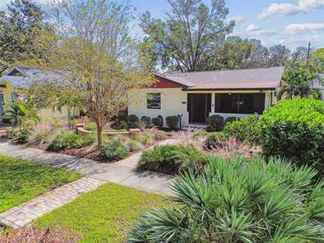 Cute bungalow with nicely landscaped front yard and walkway at 830 23Rd N Ave, St Petersburg, FL 33704