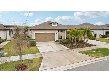 Single-Gathering home with attached garage and landscaping at 6320 Cliveden Ct, Apollo Beach, FL 33572