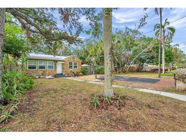 House exterior with stone facade and landscaping at 2819 50Th S St, Gulfport, FL 33707