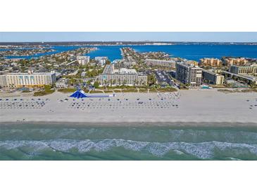 Aerial view of beachfront property with pool and waterpark at 5500 Gulf Blvd # 2240, St Pete Beach, FL 33706