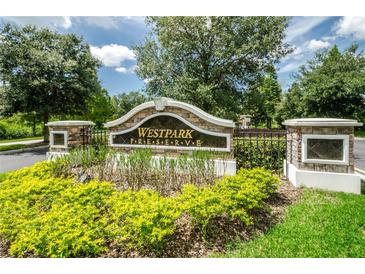 Westpark Preserve community entrance sign with lush landscaping at 10425 Westpark Preserve Blvd, Tampa, FL 33625