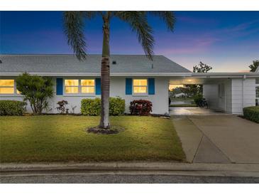 Inviting exterior of a single-story home with well-manicured lawn at 4519 Lexington Cir # 4519, Bradenton, FL 34210