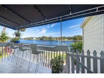 Waterfront balcony with seating, offering stunning views at 2424 W Tampa Bay Blvd # C212, Tampa, FL 33607