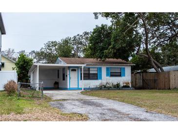 Charming bungalow with blue accents and carport at 2480 18Th N Ave, St Petersburg, FL 33713