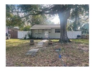 One-story house with a yard and walkway at 4034 39Th N Ave, St Petersburg, FL 33714