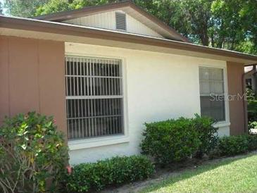 Neat ranch-style home with well-manicured landscaping at 2300 Shelly Dr # C, Palm Harbor, FL 34684