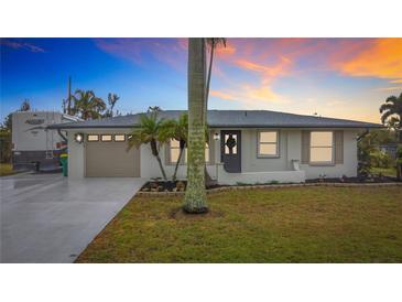 Updated single story home with attached garage and RV parking at 141 Singapore Rd, Punta Gorda, FL 33950