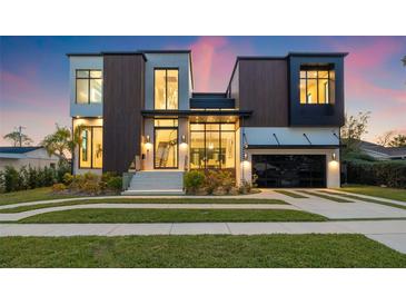 Modern two-story home with dark wood and white exterior at 730 W Alda Ne Way, St Petersburg, FL 33704