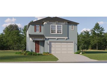 Two-story home with attached garage and landscaping at 11555 E 71St Ter, Palmetto, FL 34221