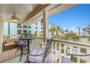 Relax on this balcony overlooking the beach and ocean at 2406 Gulf Blvd # 204, Indian Rocks Beach, FL 33785