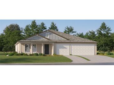 Attractive one-story house with a two-car garage and well-manicured lawn at 15233 Rainbow Quartz St, Wimauma, FL 33598