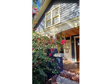 Charming Craftsman home with a welcoming front porch and lush landscaping at 2445 3Rd N Ave, St Petersburg, FL 33713