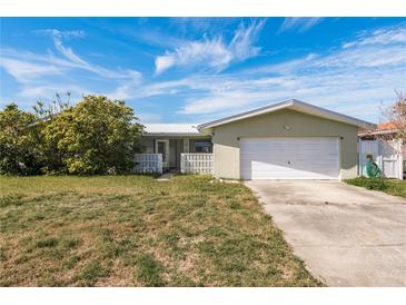 Ranch-style home with attached garage and spacious yard at 11651 Grove St, Seminole, FL 33772