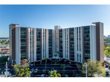 Condo building with parking and water views at 10355 Paradise Blvd # 207, Treasure Island, FL 33706